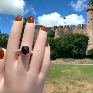 Medieval Faire vibe. Sterling silver and garnet ring.